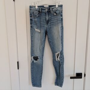 Distressed Light Blue Women’s Skinny Jeans